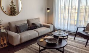 Studio arthur casas blends blue accents with neutral tones for apartment in libson