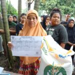Penyaluran Program Beras  Bulog di Desa Tambakbaya
