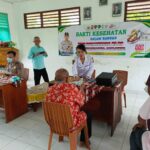 Senyum Bahagia Lansia Tugumulyo: Polres Musi Rawas Gelar Pengobatan Gratis dan Salurkan Tali Asih